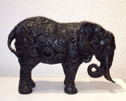 Bronze resin elephant, skin is a representation of clock parts